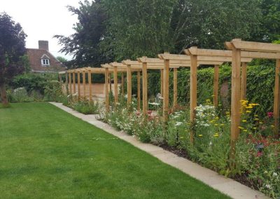 Creating height and interest with wooden pergolas